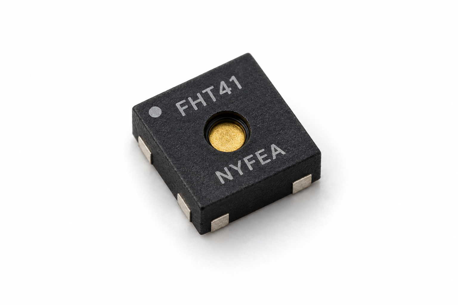NYFEA FHT41 digital temperature and humidity sensor in a four-pad DFN package, shown at a 45-degree angle